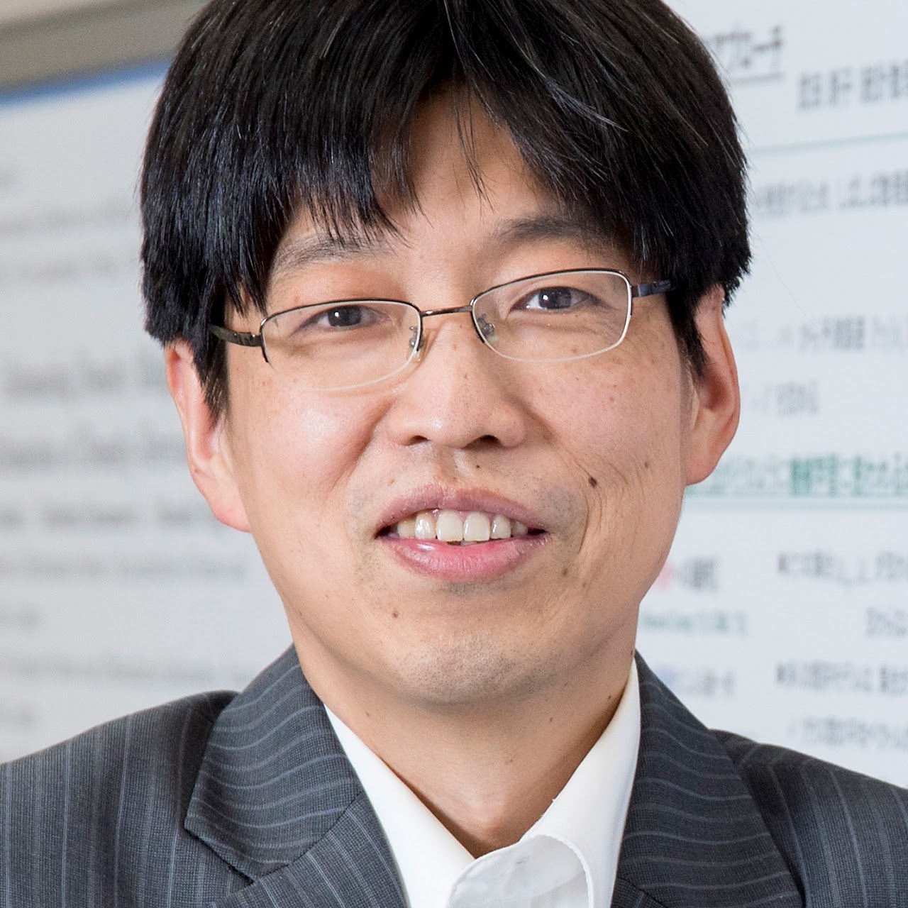 津田 宏治